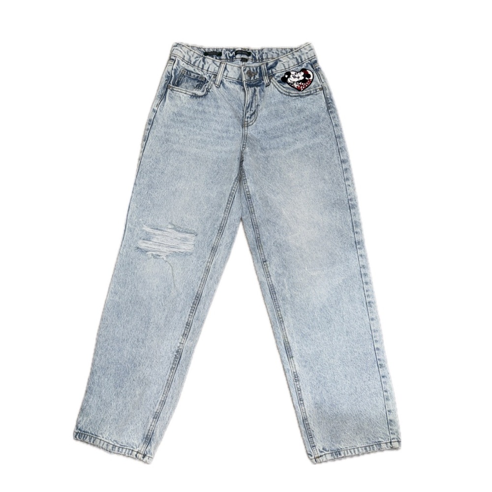 Light Blue Distressed Jeans with Patch